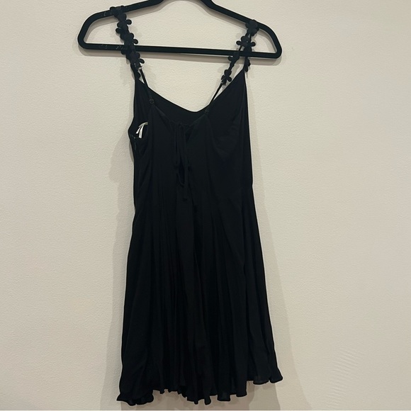 Beautiful Black Flowy Dress with Tie Up Back and Flower Detailing on Straps - Picture 2 of 5